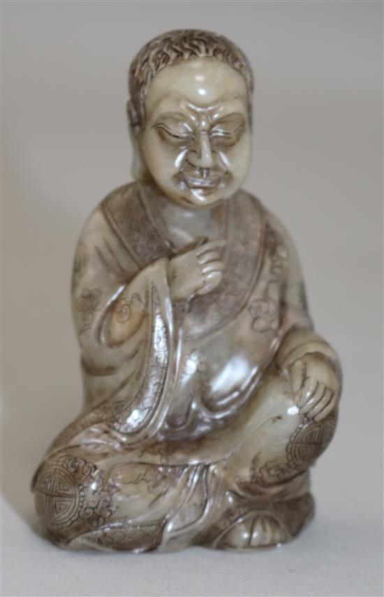 A Chinese soapstone seated figure of Luohan, 8.5cm